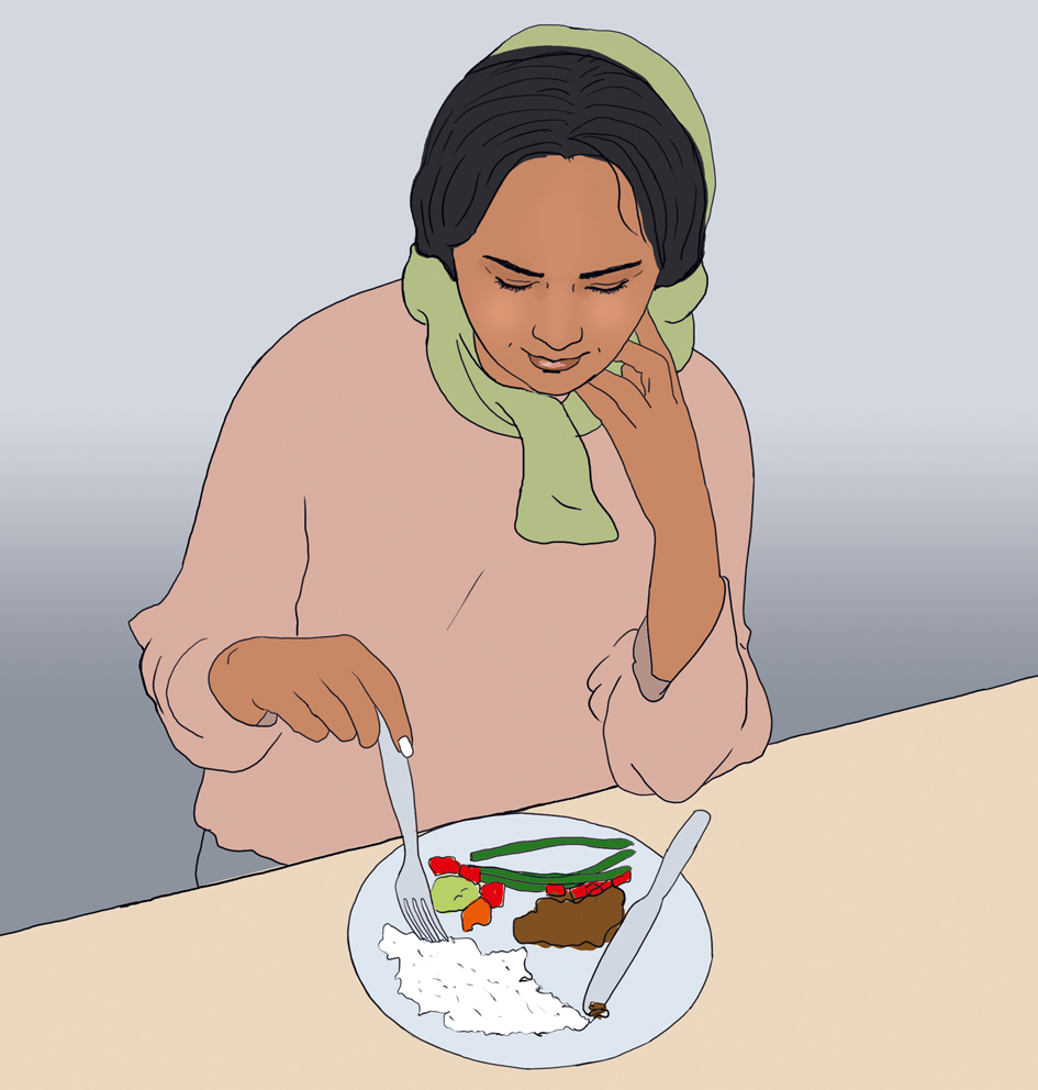 En person som spiser en bolle med frokostblanding