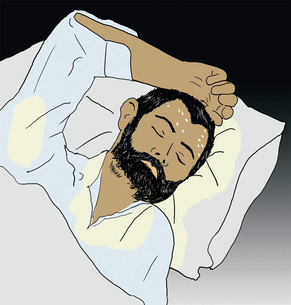 En person som ligger i sengen og svetter