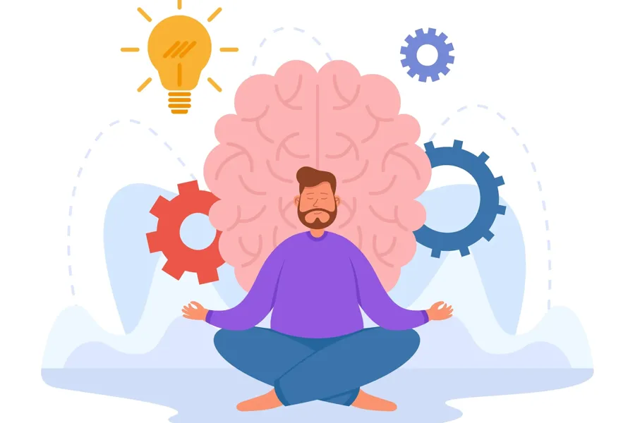 Person som sitter i meditasjon