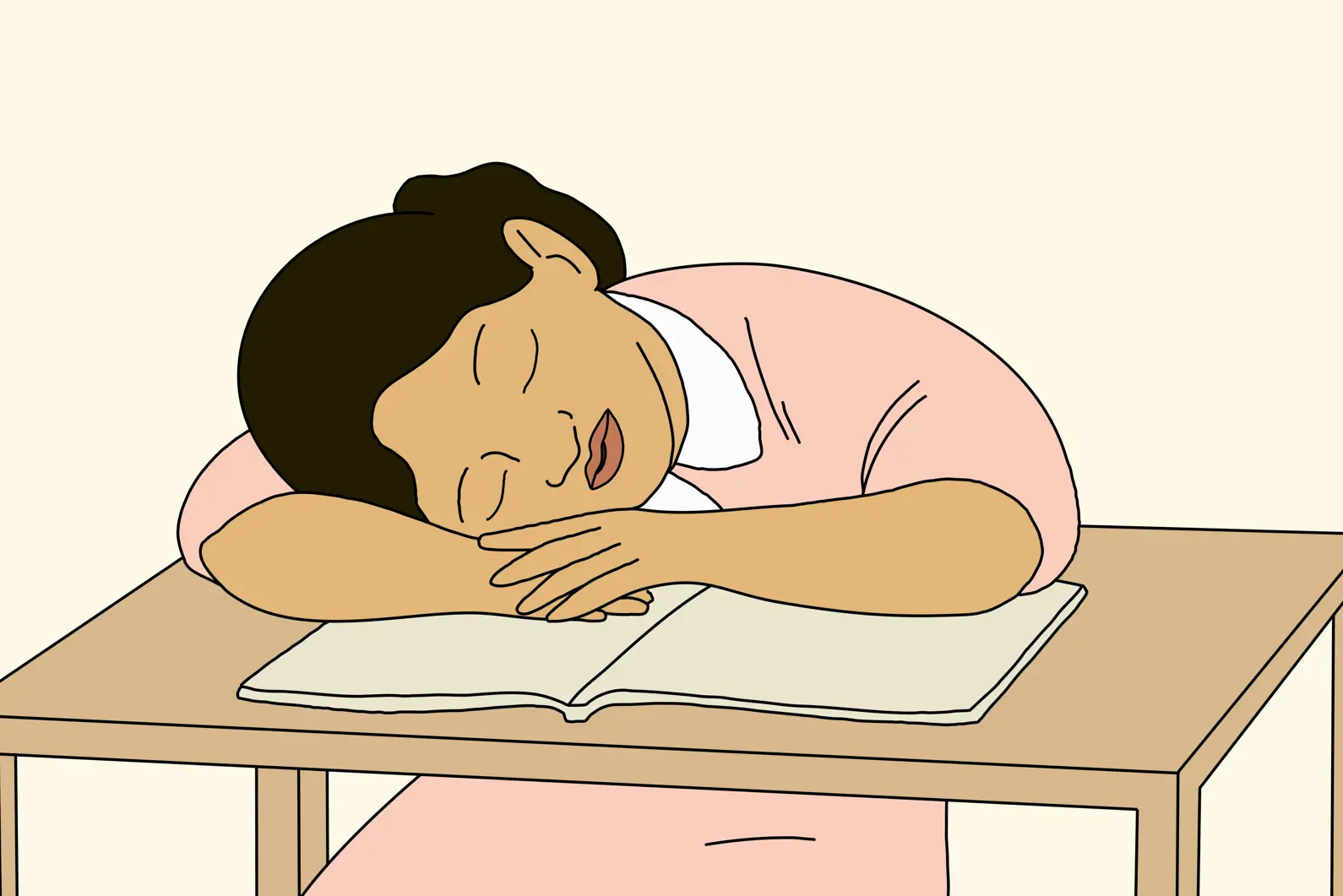 Barn som sover med hodet på armene på et bord