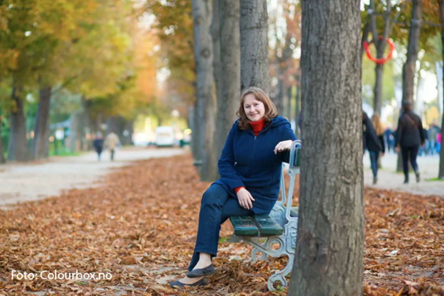 A person sitting on a bench